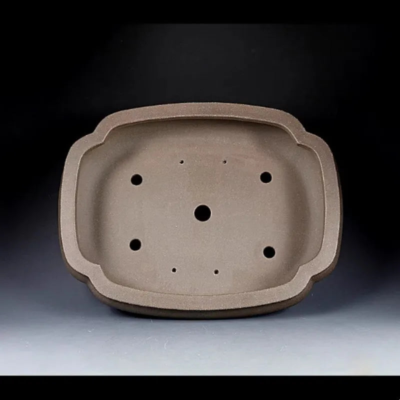 Handmade antique papaya-shaped purple clay flower pot for large plants.