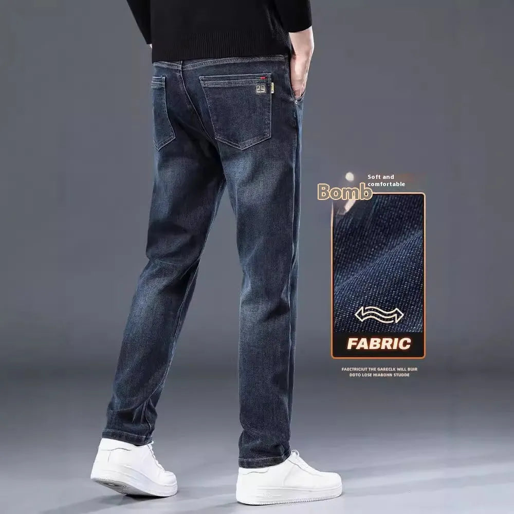 Men's slim straight casual trousers in blue grey, showing loose fit and street style.