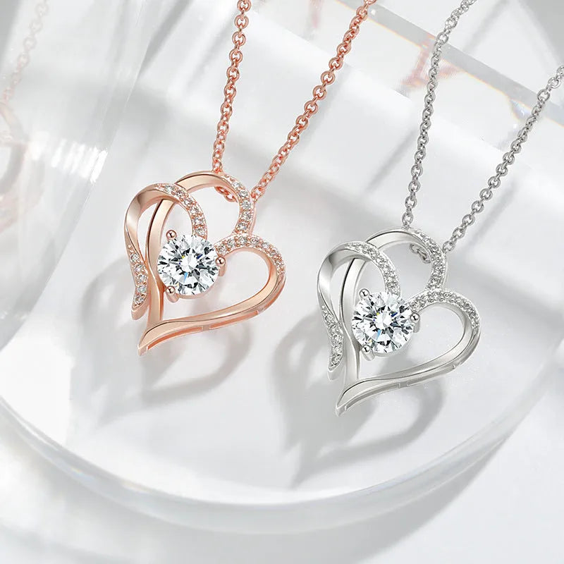 Heart-shaped women's necklace in 925 silver with diamond treatment, showing three colour options
