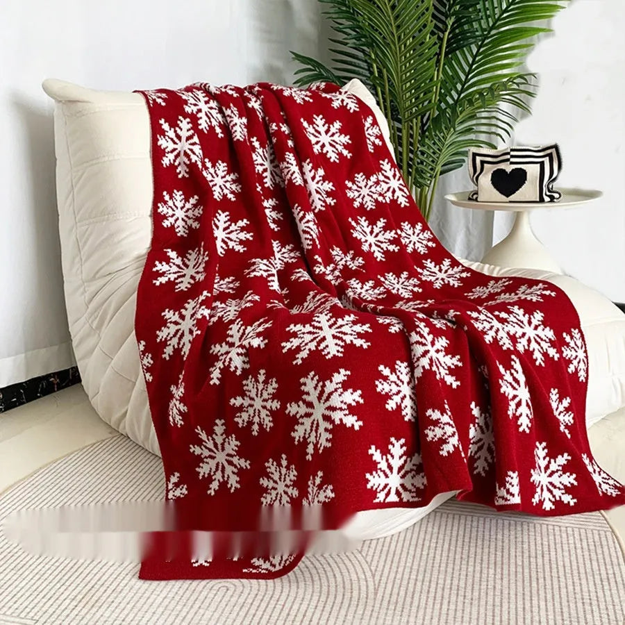 Personalised acrylic Christmas blanket with snowflake or reindeer design in two sizes.