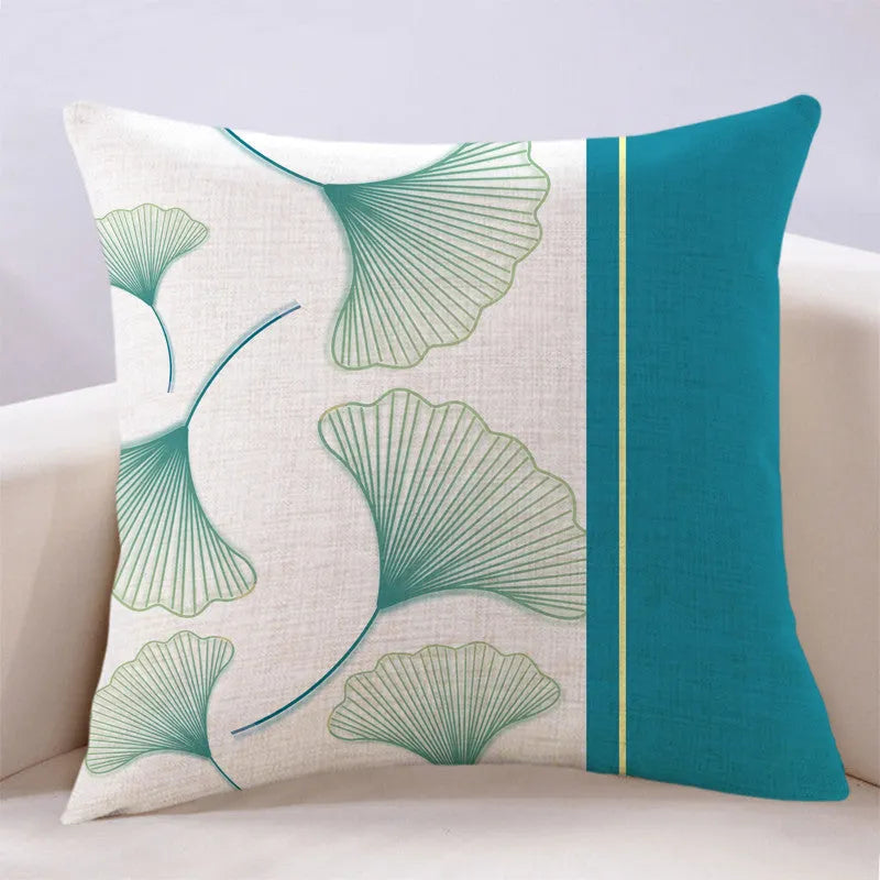 Ginkgo leaf printed square cushion cover on a sofa, available in multiple colours and sizes