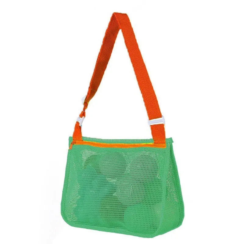 Blue nylon mesh travel storage bag with black handle and zip seal for children's clothing organisation