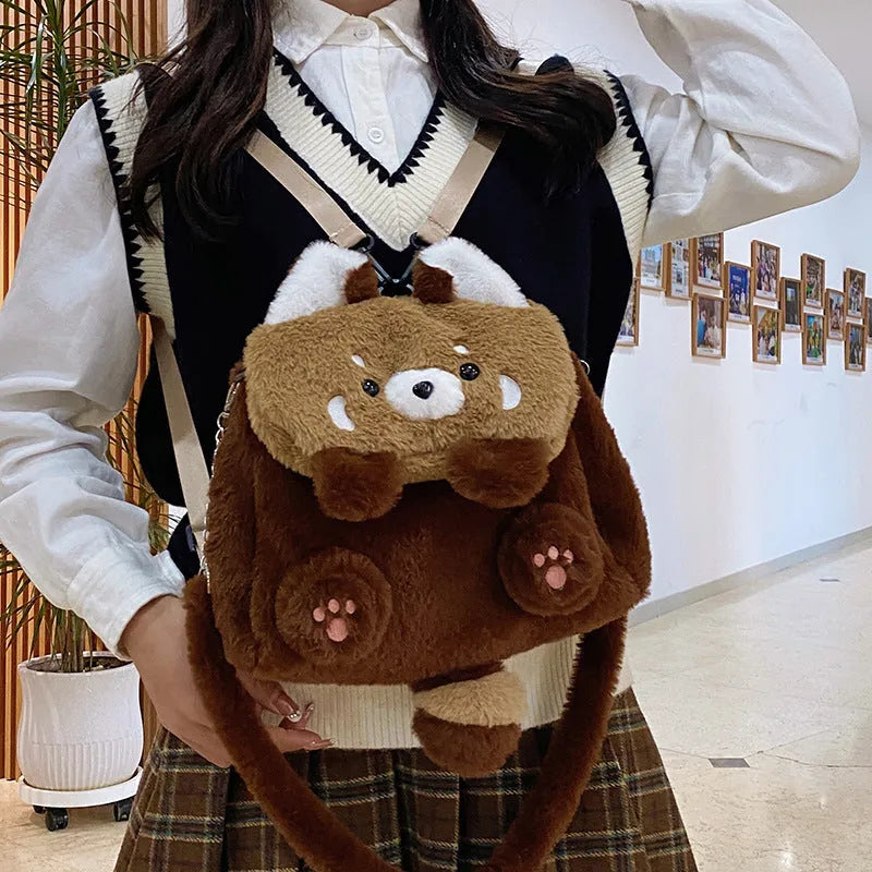 Coati plush cartoon backpack in brown with soft plush exterior and polyester lining, height 26cm, width 27cm