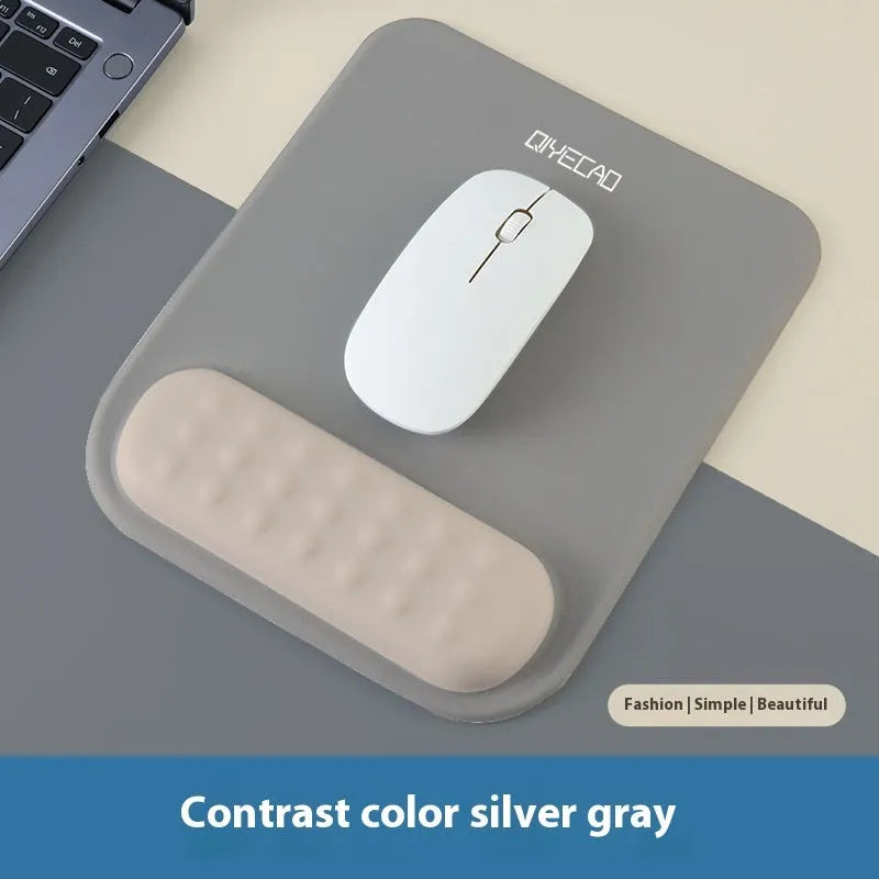 Ergonomic mouse pad with wrist rest in cloth silicone construction showing colour pattern options