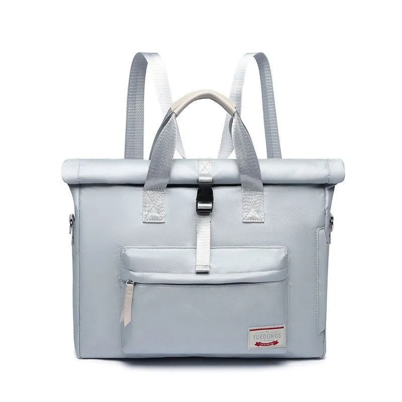 Shockproof waterproof nylon laptop bag in black, shown in medium and large sizes for 14 inch and 15.6 inch laptops.