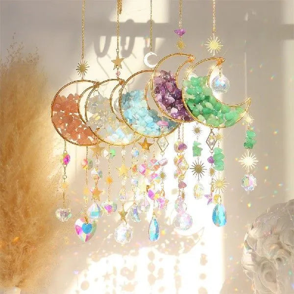 K9 crystal moon-shaped car pendant hanging, showing reflective surface and colour options.