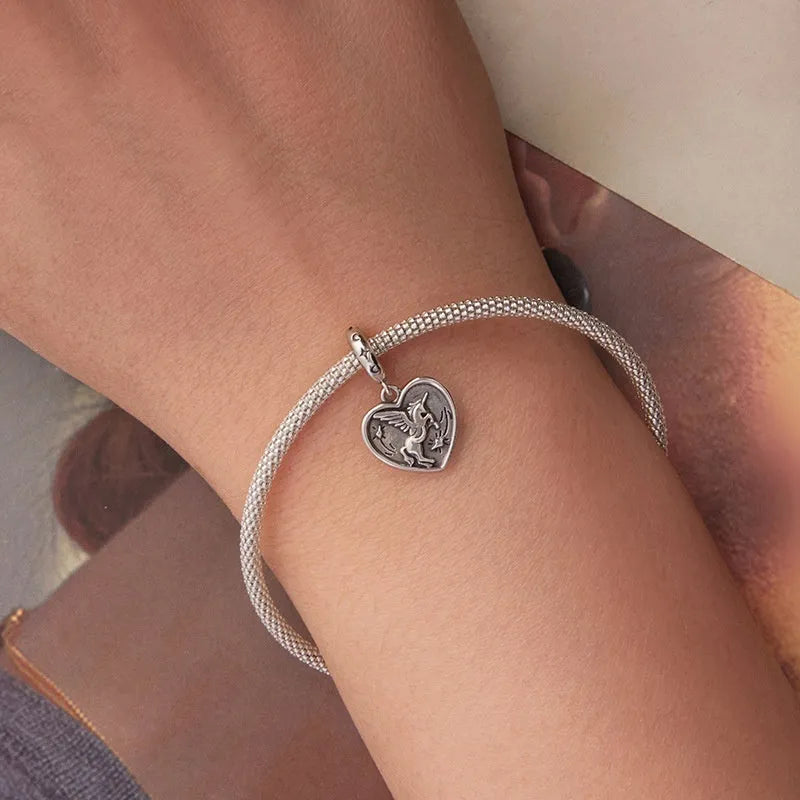 S925 sterling silver love heart bead with pearlescent finish, 2.3cm high, 1.3cm wide, 0.45cm aperture