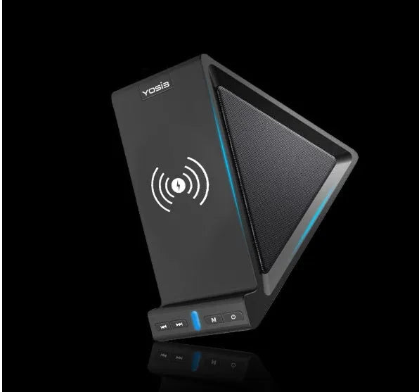 Black multifunctional Bluetooth speaker with integrated phone stand and wireless charging pad, showing size scale.