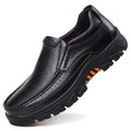 Men's black leather slip-on business casual shoes with a rubber sole, shown on a neutral background.