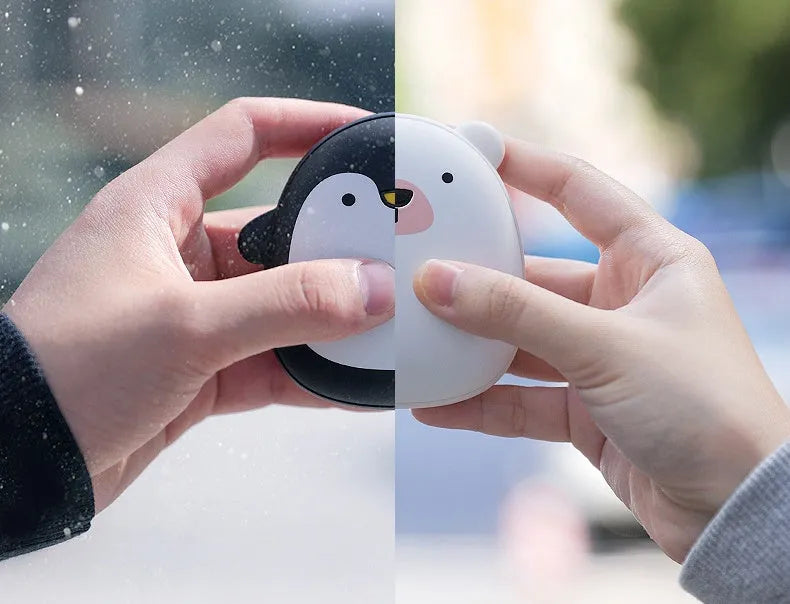 Cartoon penguin and polar bear USB rechargeable hand warmer and power bank showing double-side heating