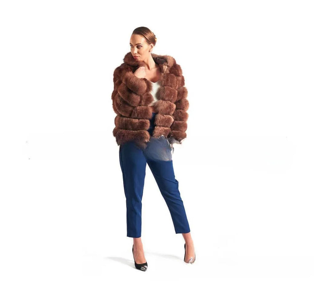 Women's loose brown faux fur hooded coat on a model, street fashion style.