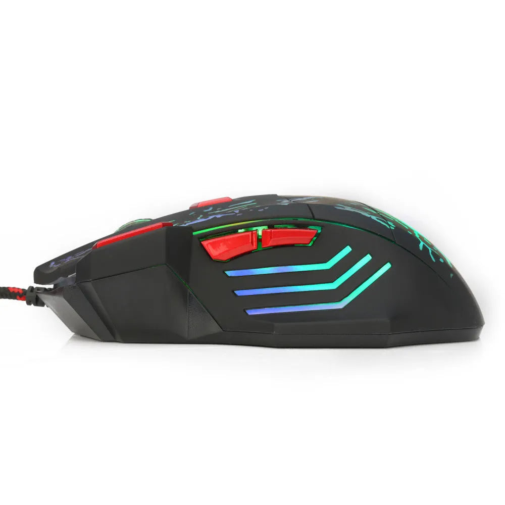 Black wired gaming mouse with colourful luminous lighting effects on desktop