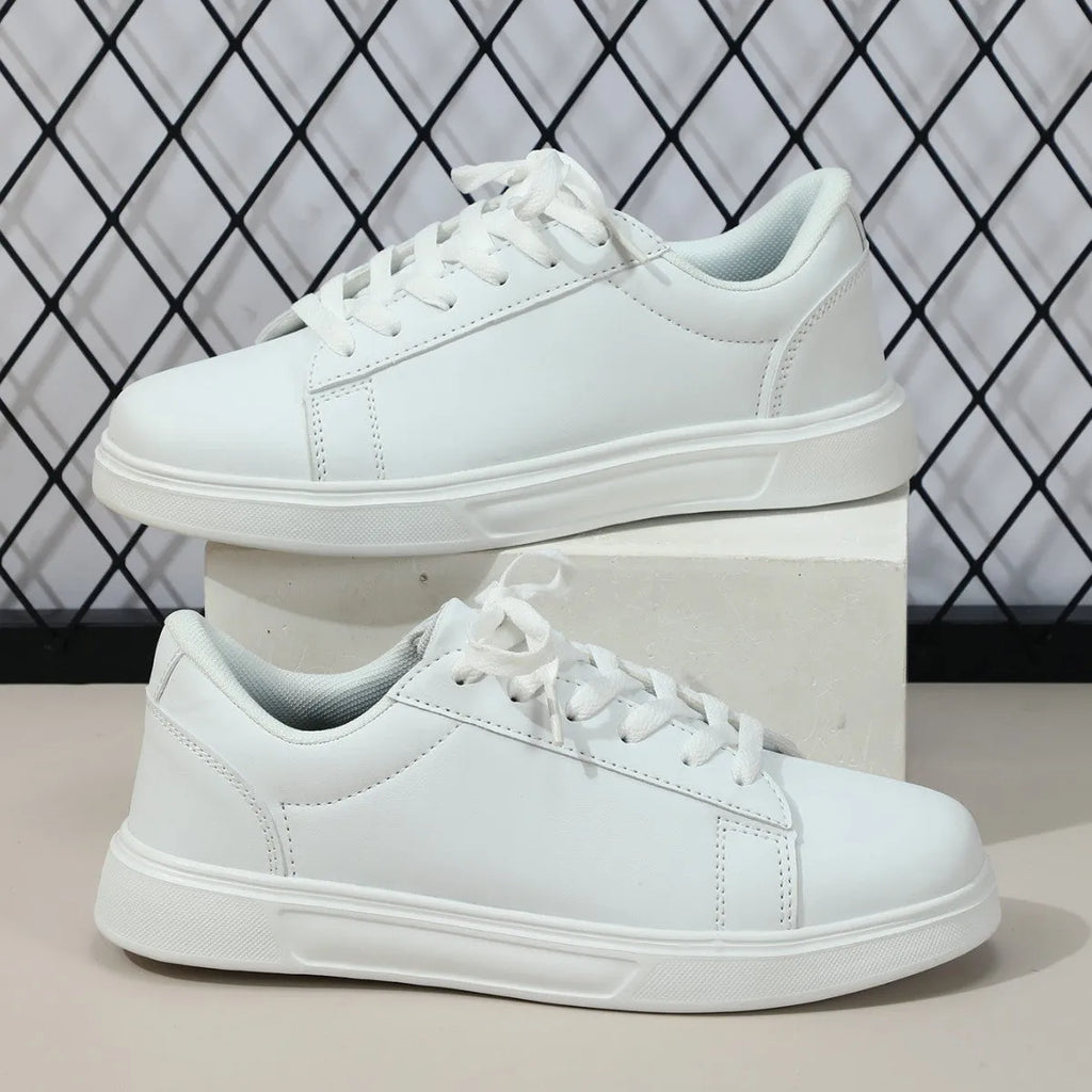 Women's platform skateboard sneaker in beige brown with cross strap and round toe design