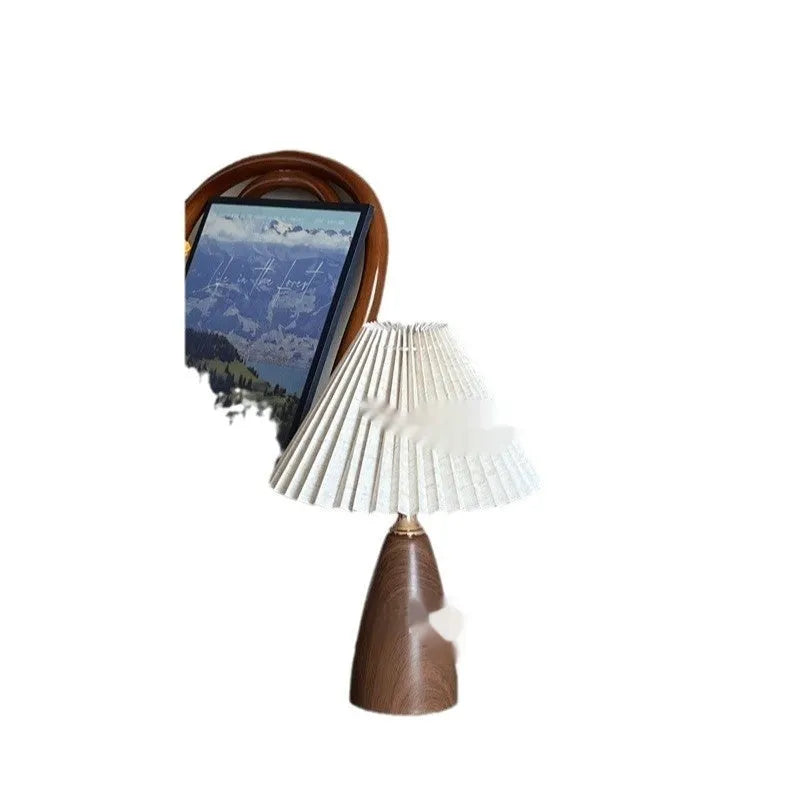 Nordic retro ceramic table lamp with pleated shade and remote control on bedside table