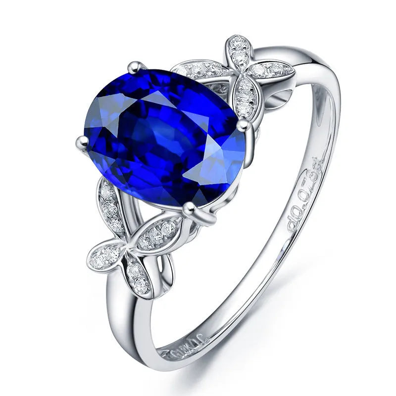 Women's copper butterfly ring with heart shape design in red and blue colour options