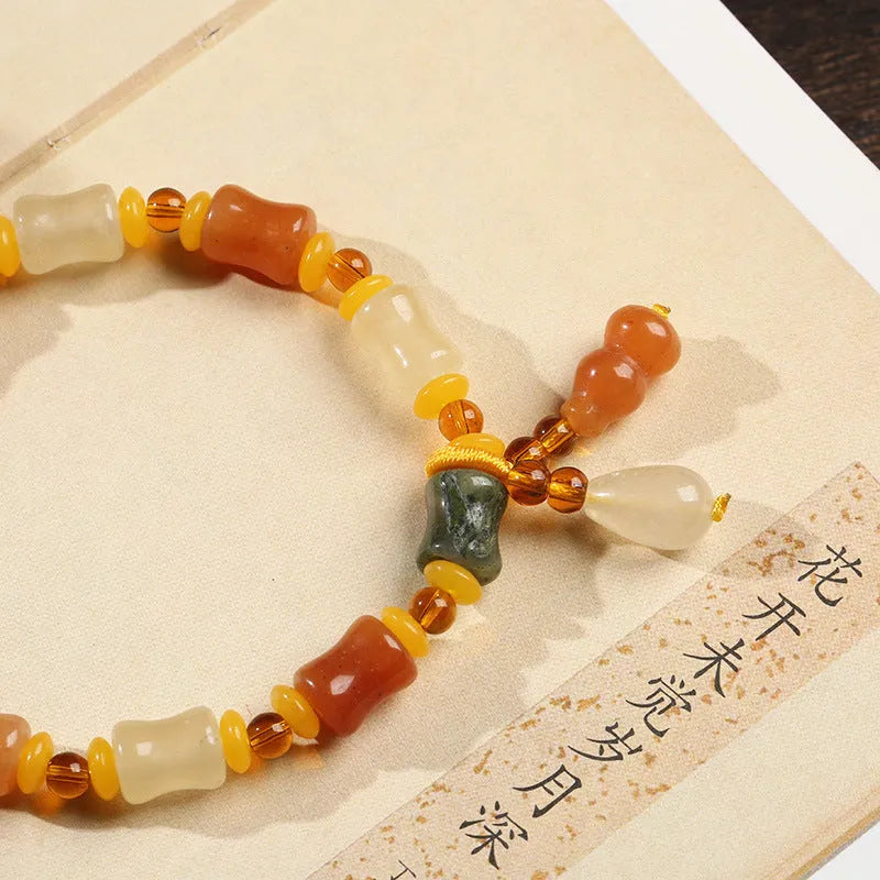 Natural Xinjiang Jinsi Jade small bone beads bracelet with geometric Chinese design