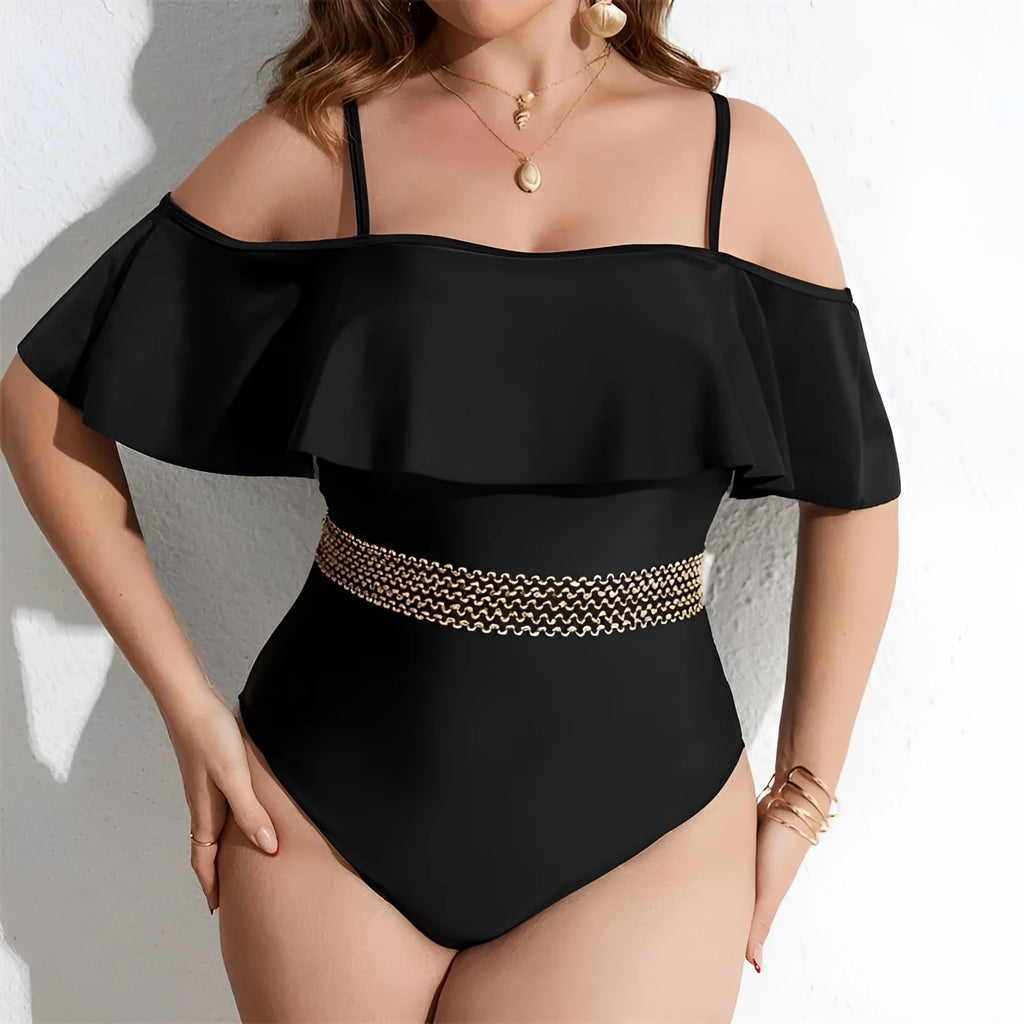 Black women's one-piece swimsuit on a hanger, plus size range 0XL to 4XL.