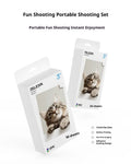 Pocket photo printer in plastic casing with carry-on bag and photo paper on table