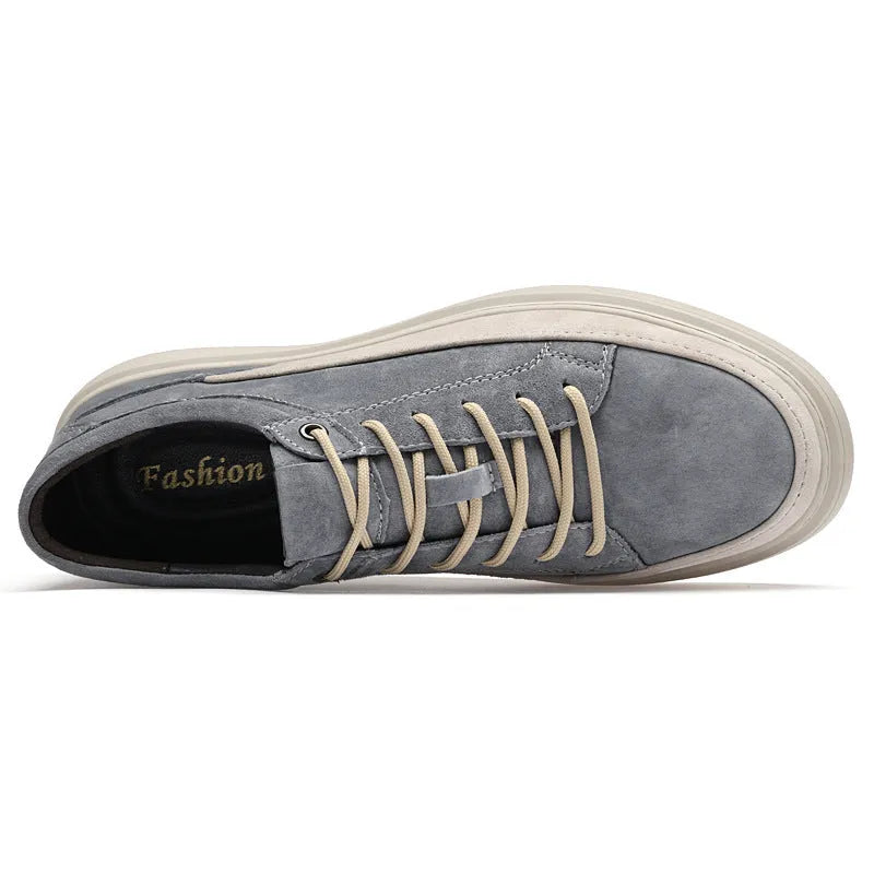 Men's gray casual skate shoes with pigskin upper and rubber sole on a white background.