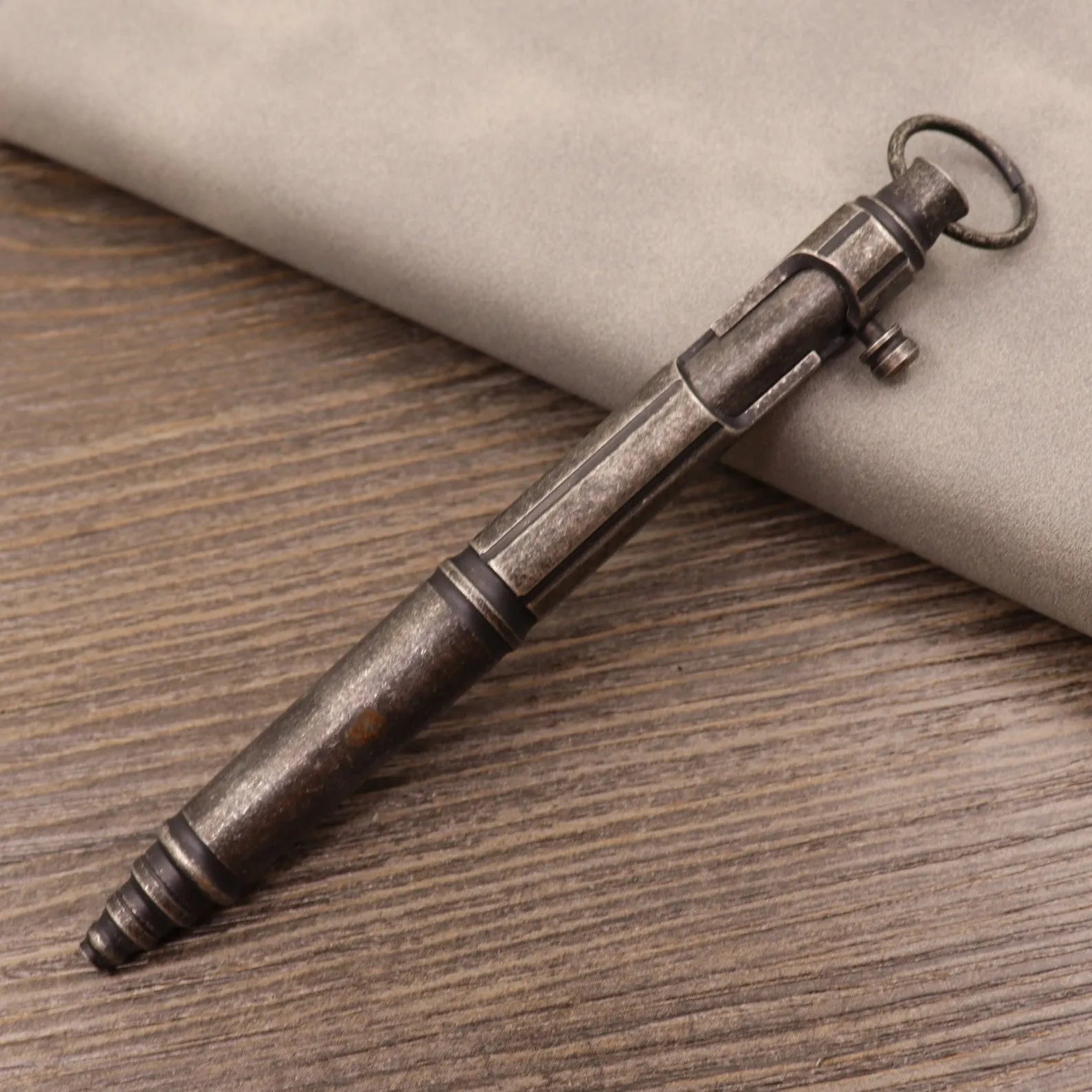 Brass tactical pen with retro colour finish and press mechanism
