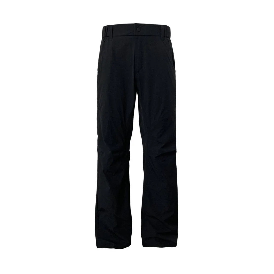 Man wearing grey 3D cut deconstructed casual trousers with a straight leg and elasticated waist.