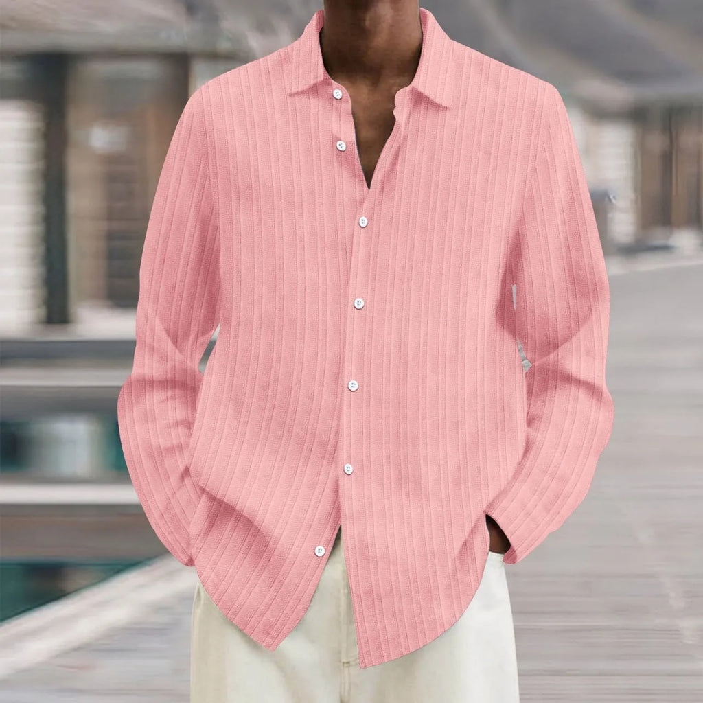 A man's loose-fit striped cardigan shirt with long sleeves in a British style design.
