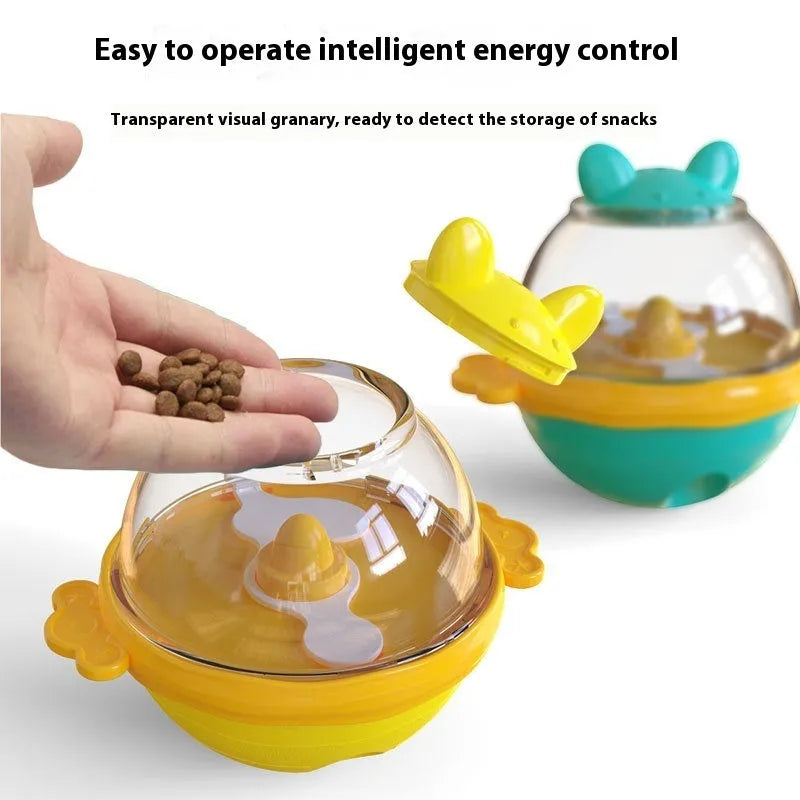 TPR dog puzzle feeder tumbler toy in blue and yellow colours, showing treat dispenser holes.