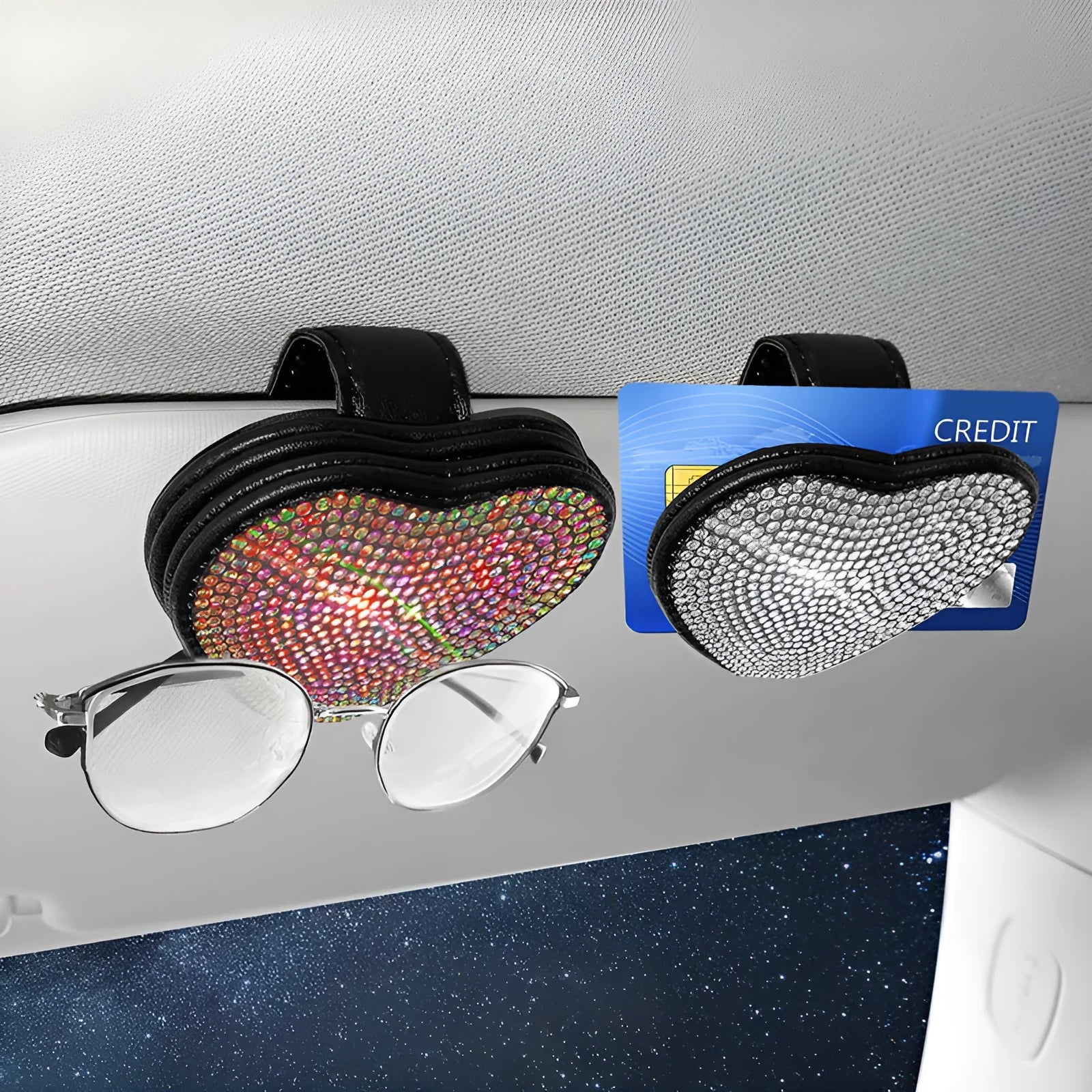 Black diamond-encrusted PU leather clip holding sunglasses and a ticket on a car sun visor.