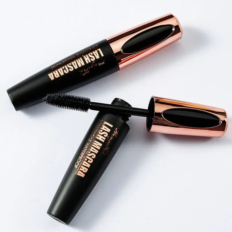 Black waterproof mascara tube with wand applicator for curling lashes and preventing smudging