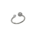Gold or silver coloured open-end ring with a round zircon pearl on a geometric band.