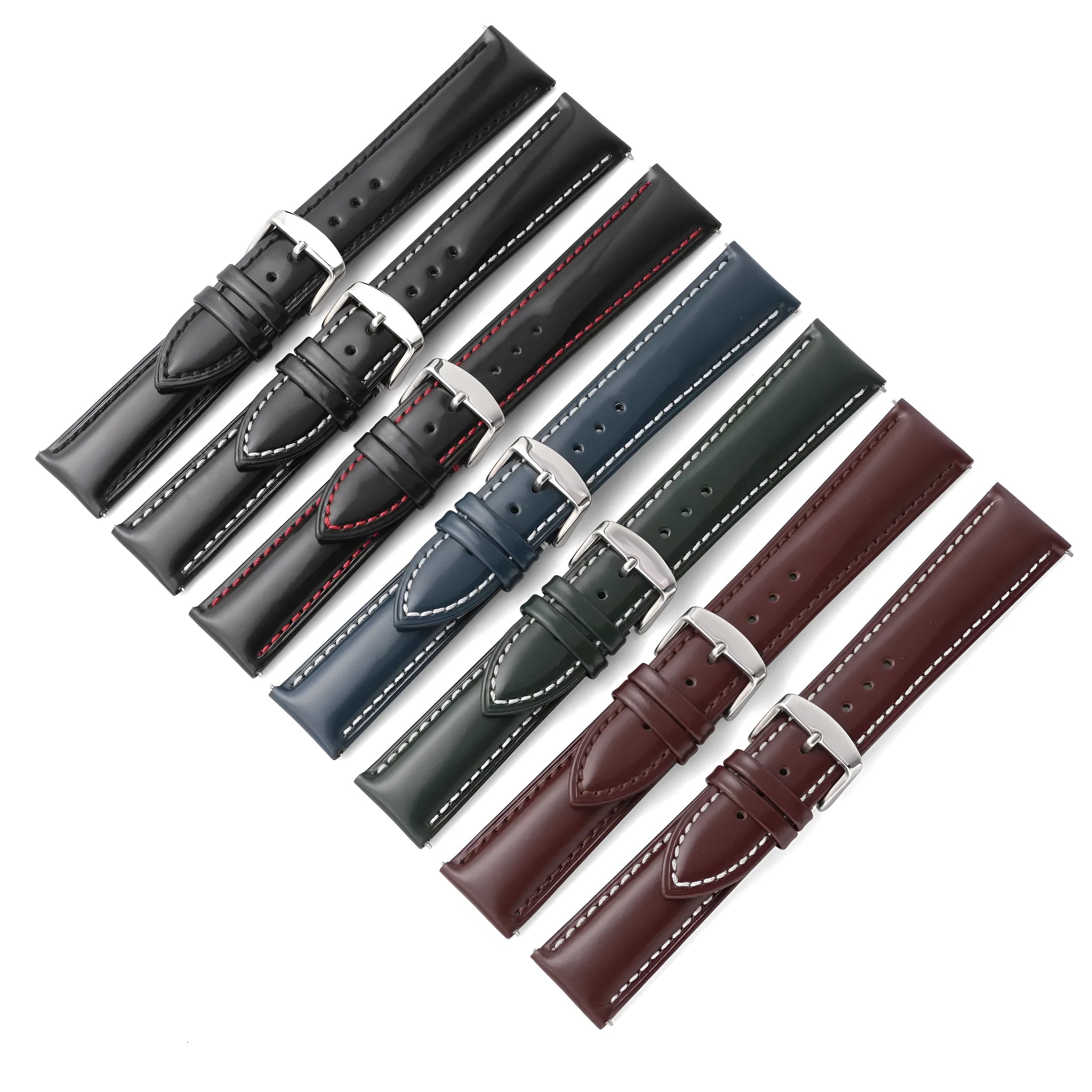 Quick release watch strap in black cowhide leather with white contrast stitching, shown detached from a watch.