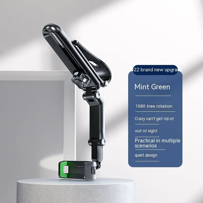 Black and green car phone holder with clip mount on a car dashboard