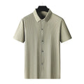 Man wearing a black and khaki striped loose-fit plus size casual shirt with a square collar.