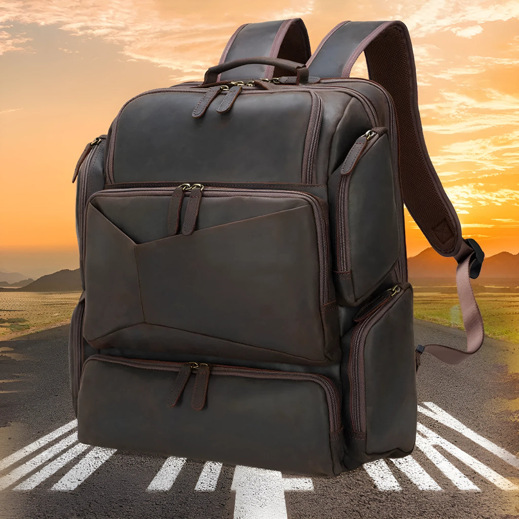 Dark brown Retro Crazy Horse leather backpack for men with a 17-inch laptop compartment open.