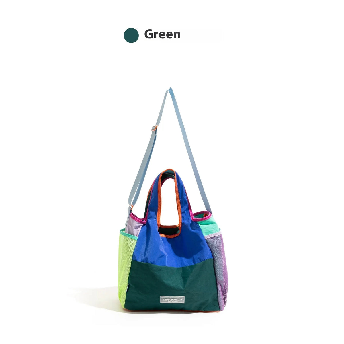 Foldable polyester tote bag in orange, green, and purple, with crossbody option