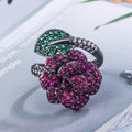 Geometric black gold ring with simulated red corundum stones on gold-plated copper band