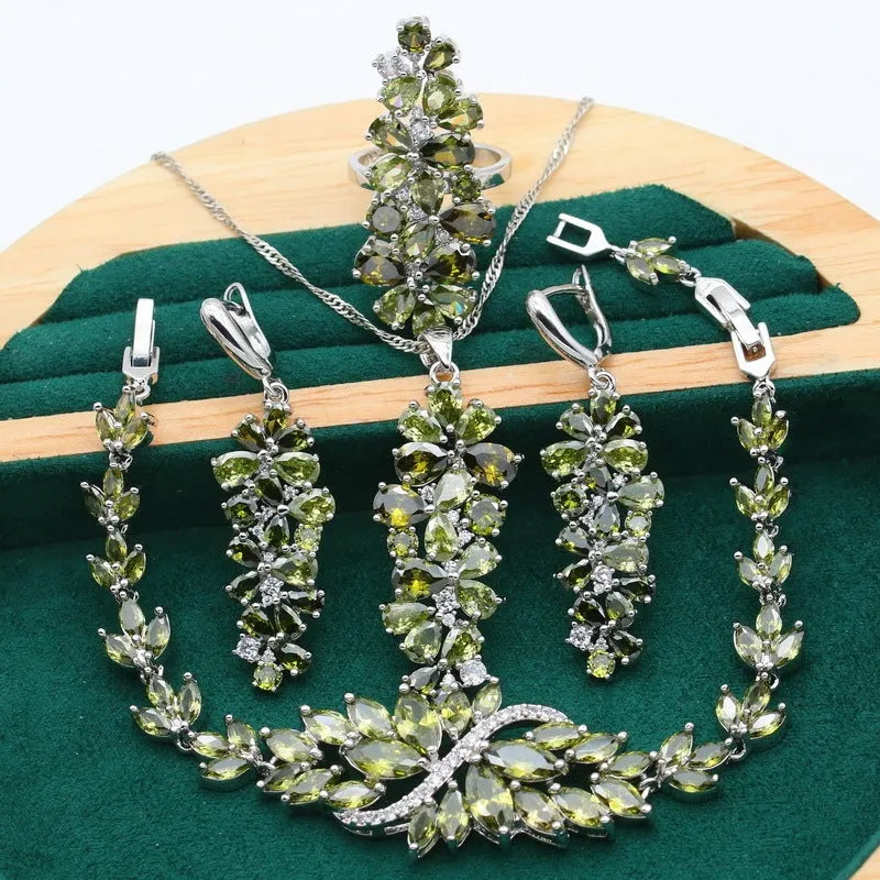 Retro jewellery set with plant pattern design showing necklace, bracelet, earrings, and ring in alloy and copper zircon