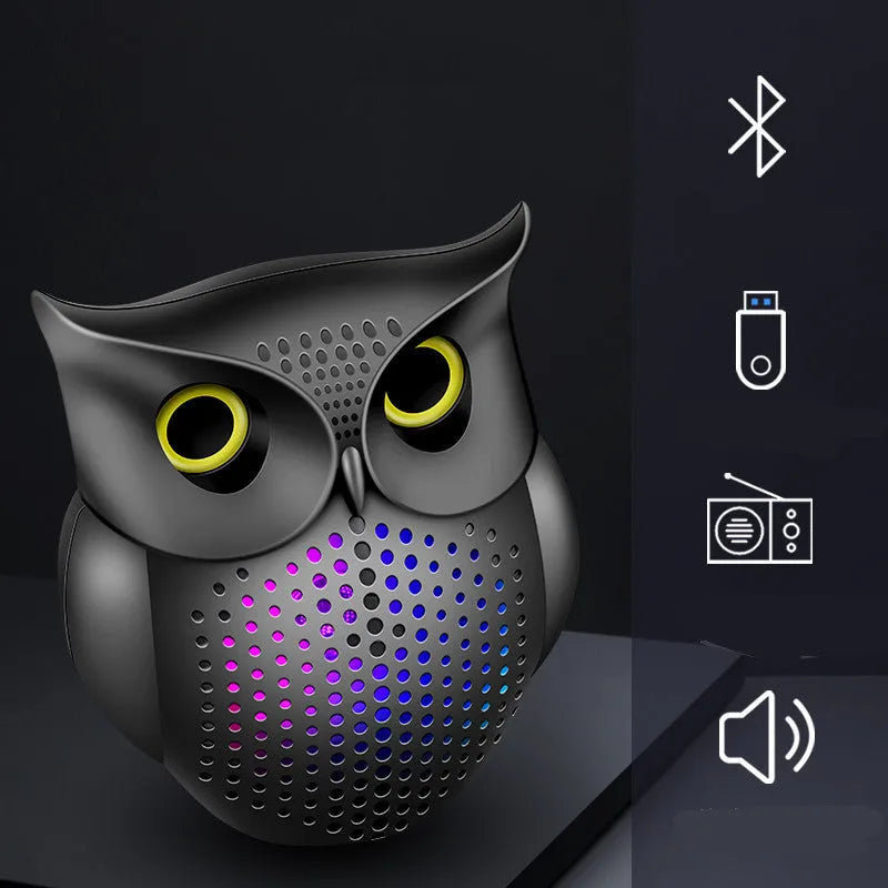 Black wireless Bluetooth speaker with cartoon owl design, compact size