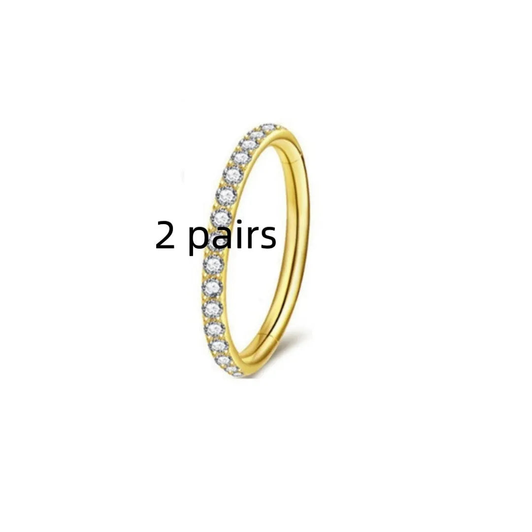 Stainless steel seamless nose ring with diamond detail in gold, rose gold and steel finishes