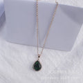 Women's drop-shaped rhinestone necklace in rose gold colour with geometric elements