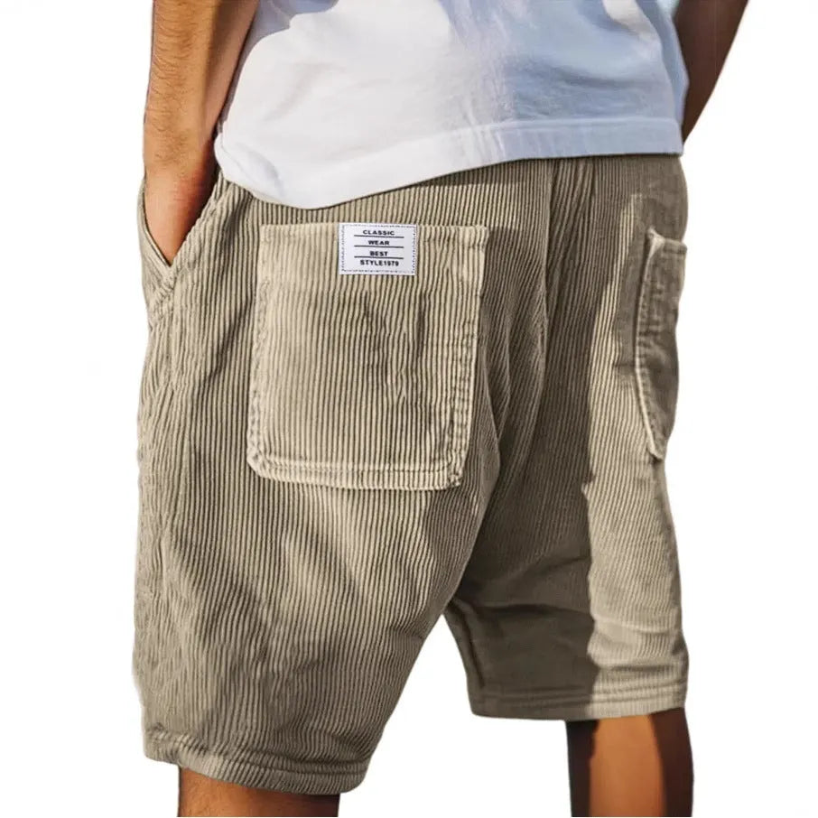 Men's straight-leg corduroy shorts with multiple pockets and embroidery detailing in grey colour