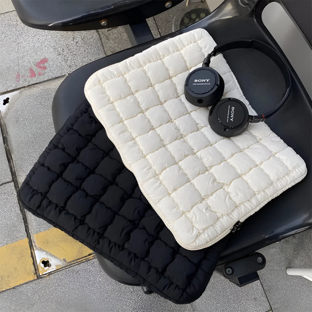 Black nylon laptop bag with cloud cotton padding shown open, sized for a 15.6 inch laptop