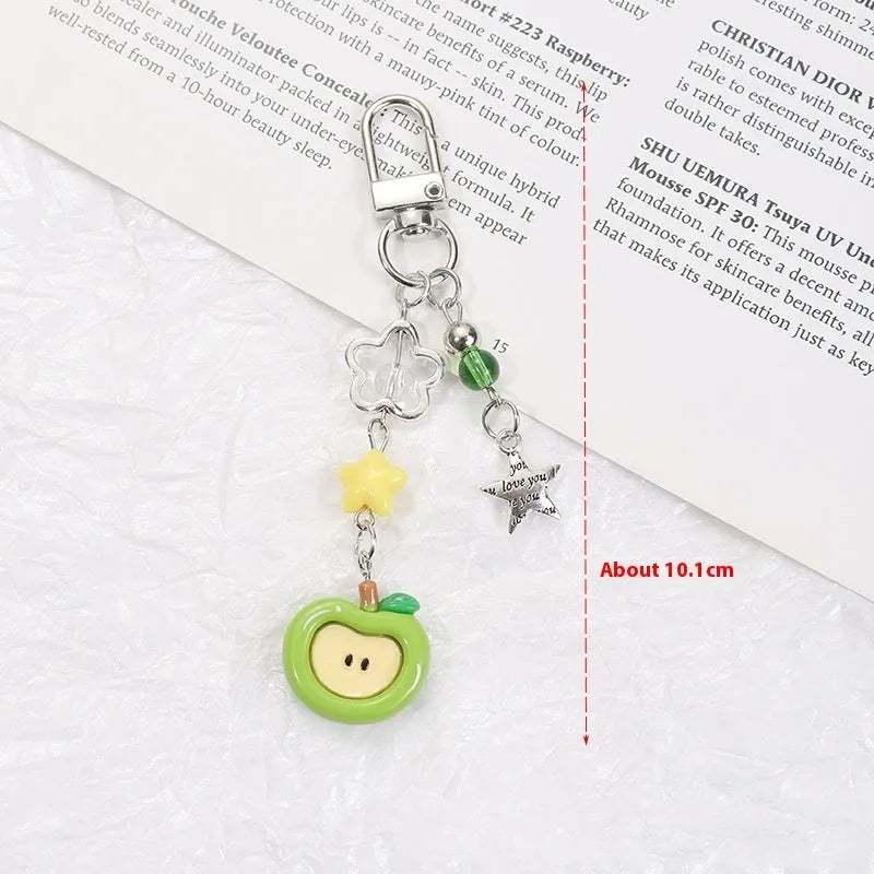 Plastic resin phone charm keychain with semi-handmade apple and strawberry fruit designs