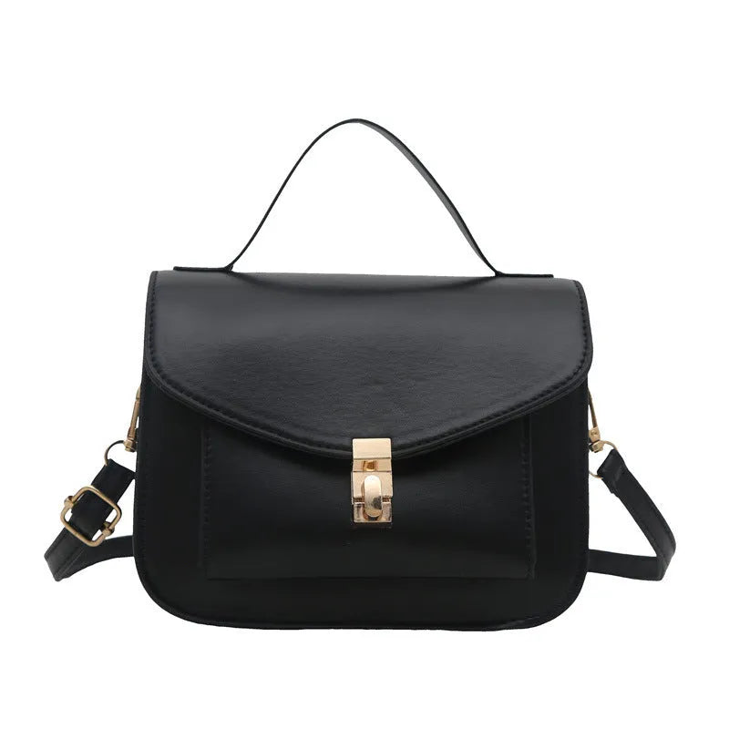 Horizontal square PU leather messenger bag in urban style with crossbody strap and sewing line detail.