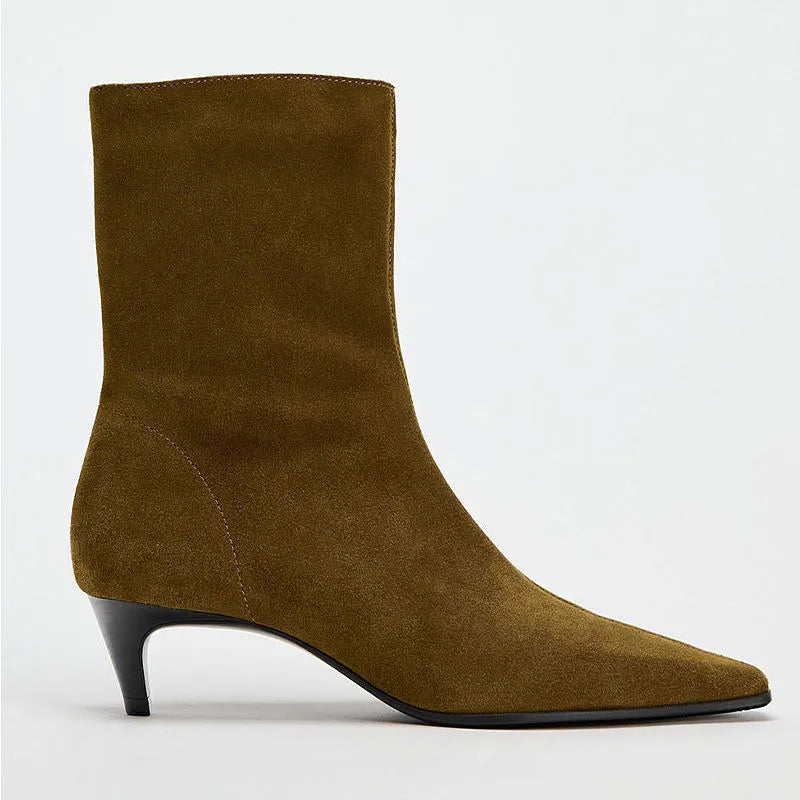 Brown square toe ankle boot with a side zip and a waterproof platform kitten heel.