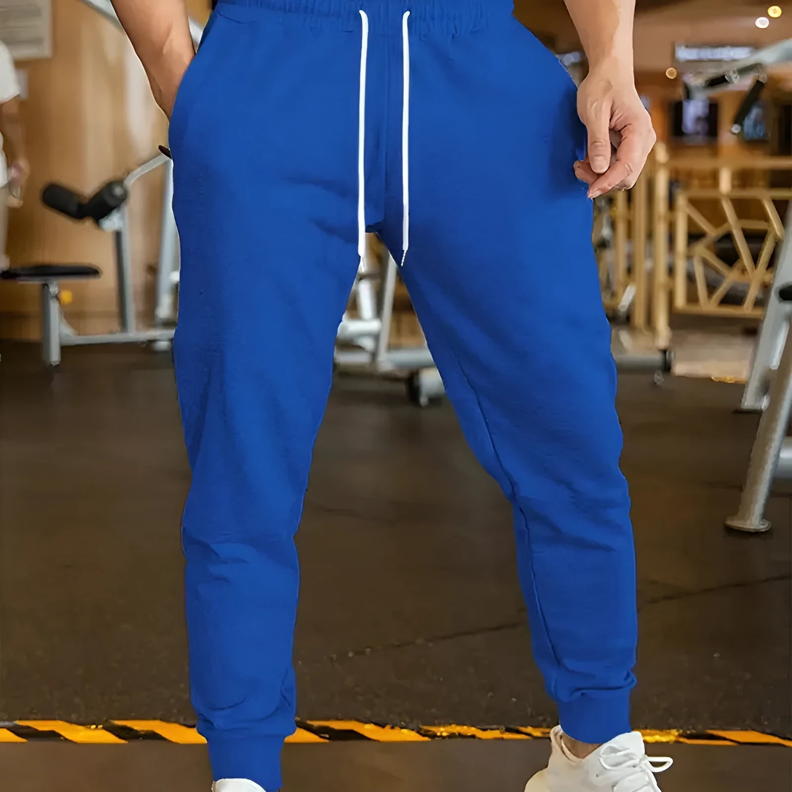 Men's linen-style trousers with elastic drawstring waist in loose fit design