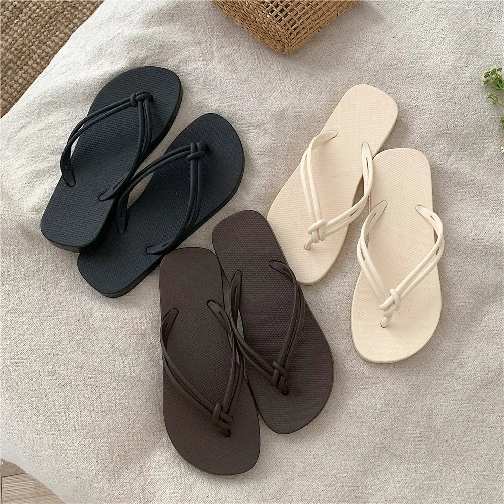 PVC casual flip flops with toe-covering design and injection moulded non-slip soles