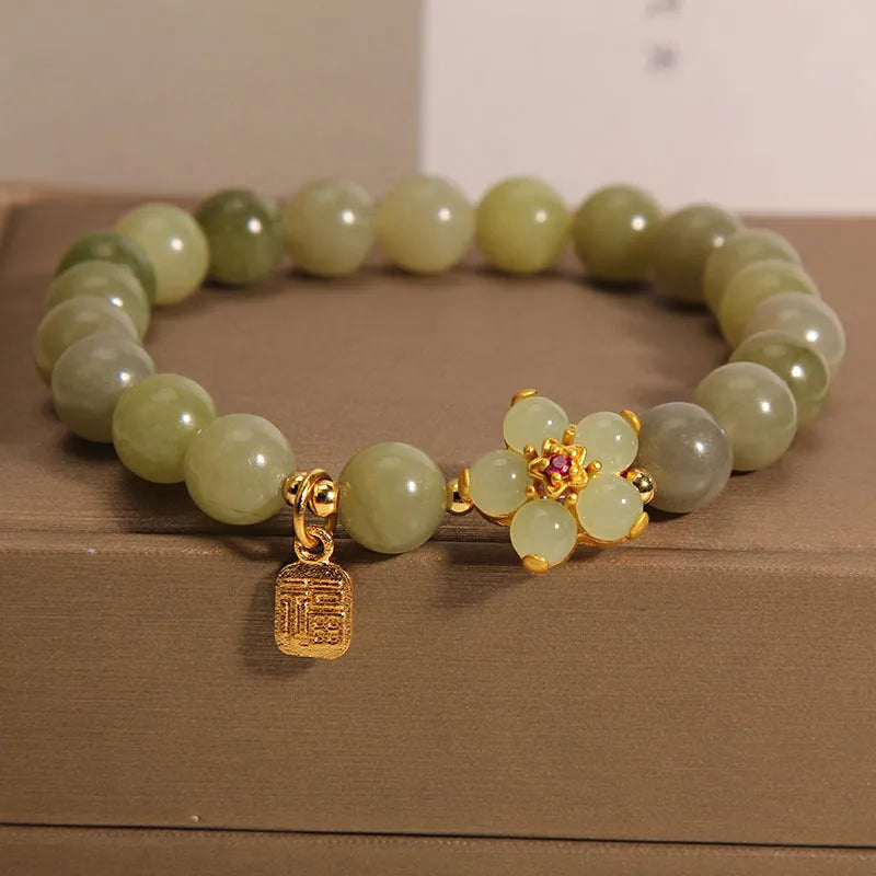 Women's alloy bracelet in grey jade colour with clasp closure for casual wear.