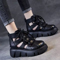 Women's black platform sandals with fish mouth toe and hollow hole leather design