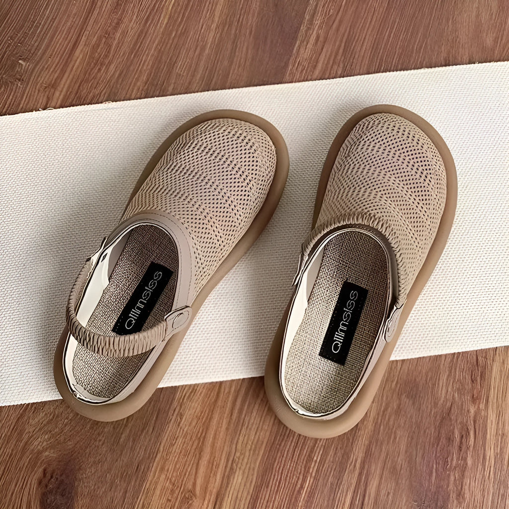 Breathable linen and mesh slip-on shoe with a soft rubber sole in milky white colour.